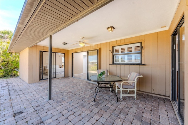 39 Bunker Pl, Rotonda West, FL 33947 - view of patio with outdoor dining area and ceiling fan