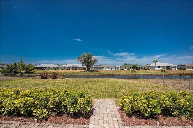 39 Bunker Pl, Rotonda West, FL 33947 - view of yard featuring fence, a residential view, and a water view
