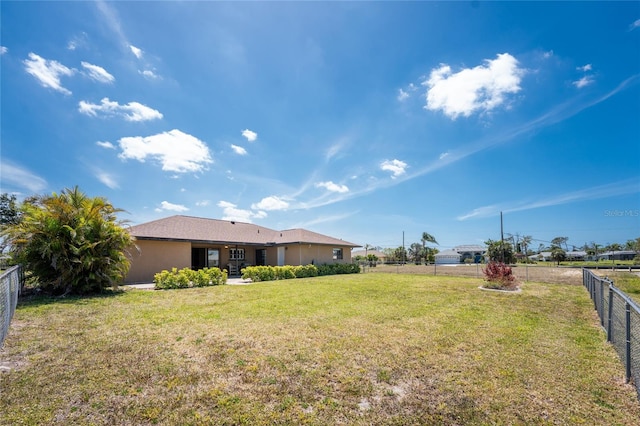 39 Bunker Pl, Rotonda West, FL 33947 - view of yard featuring fence