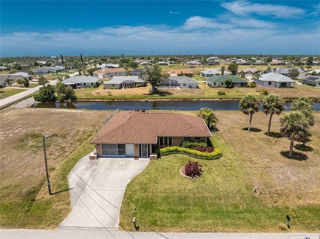 39 Bunker Pl, Rotonda West, FL 33947 - aerial view featuring a water view and a residential view