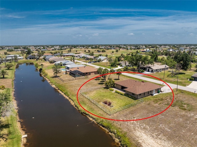 39 Bunker Pl, Rotonda West, FL 33947 - drone / aerial view featuring a water view and a residential view