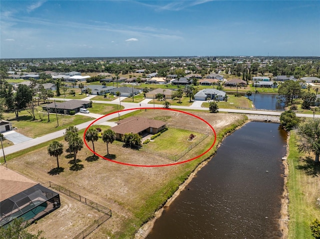 39 Bunker Pl, Rotonda West, FL 33947 - drone / aerial view featuring a water view and a residential view