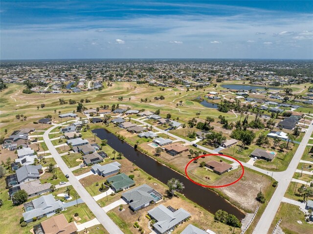 39 Bunker Pl, Rotonda West, FL 33947 - bird's eye view with a residential view, a water view, and view of golf course