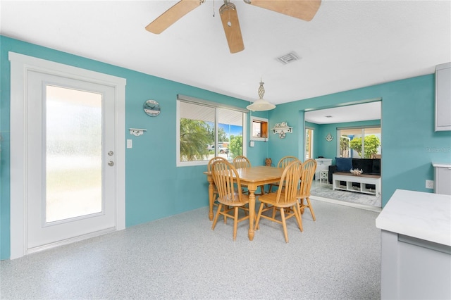 1245 Gulf Blvd, Englewood, FL 34223 - dining space with ceiling fan and visible vents