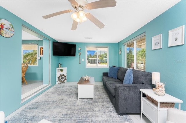 1245 Gulf Blvd, Englewood, FL 34223 - living room featuring ceiling fan and visible vents