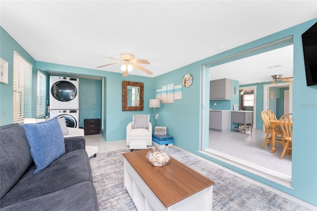 1245 Gulf Blvd, Englewood, FL 34223 - living room with a ceiling fan and stacked washer / dryer