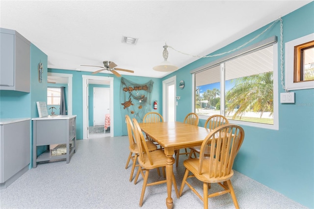 1245 Gulf Blvd, Englewood, FL 34223 - dining room featuring a ceiling fan and visible vents