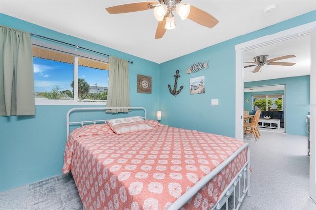 1245 Gulf Blvd, Englewood, FL 34223 - bedroom featuring multiple windows, carpet, and ceiling fan