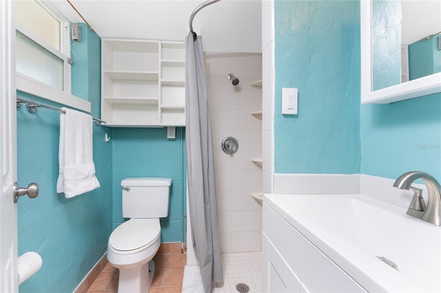 1245 Gulf Blvd, Englewood, FL 34223 - full bathroom with toilet, tile patterned floors, a tile shower, and a sink
