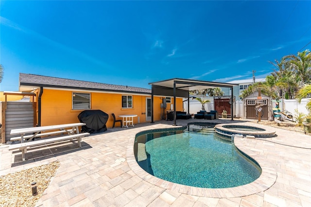1245 Gulf Blvd, Englewood, FL 34223 - view of pool featuring a storage shed, a patio, an outbuilding, and a fenced backyard