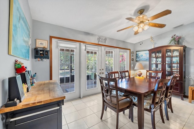 dining room featuring ceiling fan, a wealth of natural light, french doors, and visible vents