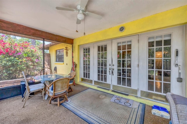sunroom featuring french doors