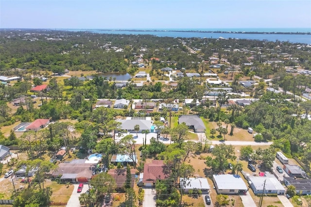 bird's eye view with a water view and a residential view