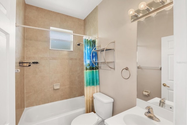 bathroom with shower / bathtub combination with curtain, toilet, and a sink