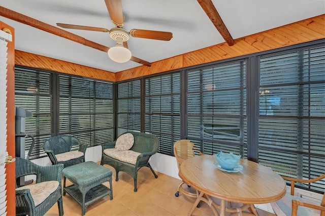sunroom with beam ceiling