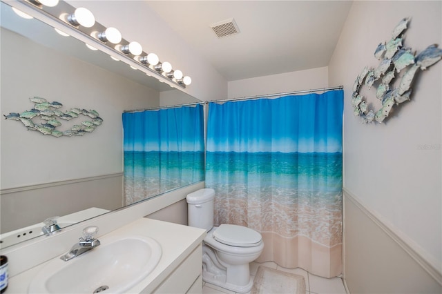 full bathroom with vanity, toilet, tile patterned flooring, and visible vents