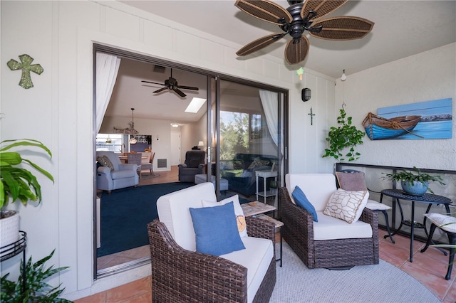 view of patio / terrace with an outdoor hangout area, visible vents, and ceiling fan