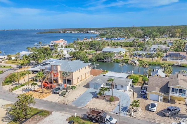 bird's eye view featuring a residential view and a water view