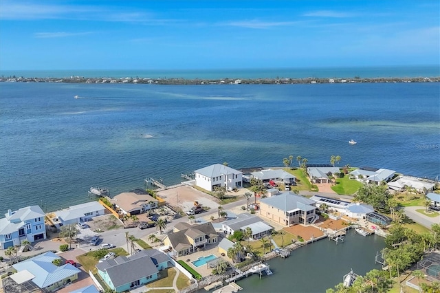 bird's eye view with a water view and a residential view