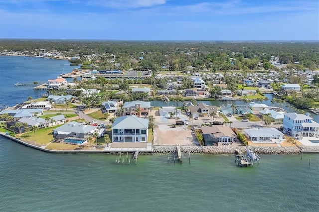 bird's eye view featuring a residential view and a water view