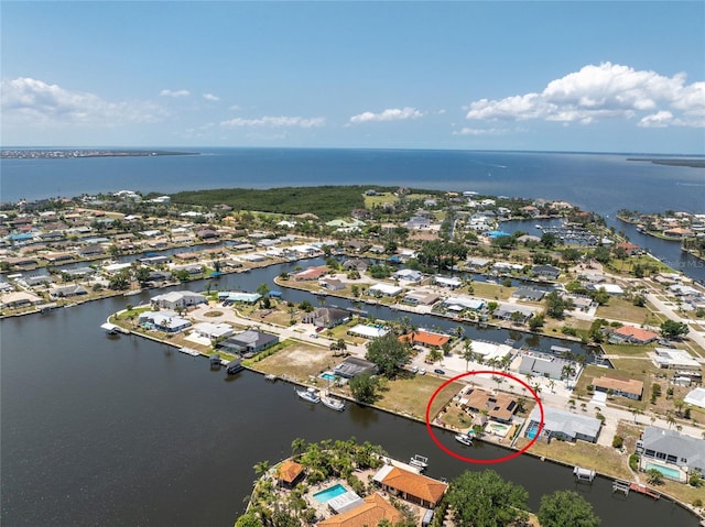 158 Morgan Ln SE, Port Charlotte, FL 33952 - aerial overview of property's location with a large body of water and nearby suburban area