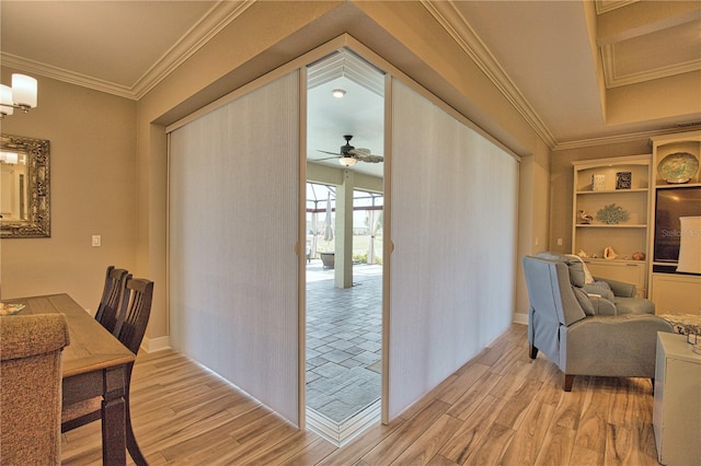 35 Medalist Rd, Rotonda West, FL 33947 - dining space with light wood-style floors, crown molding, and a ceiling fan