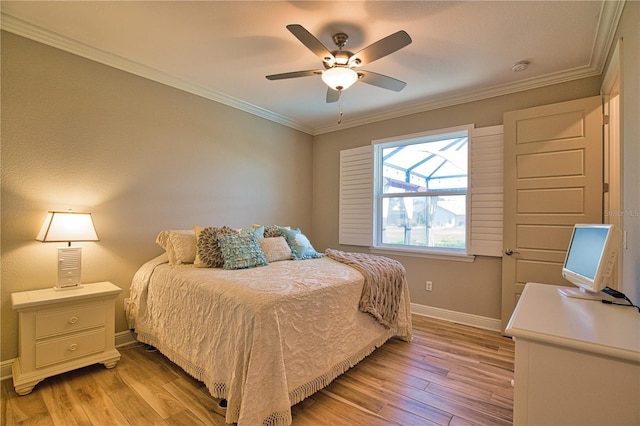35 Medalist Rd, Rotonda West, FL 33947 - bedroom featuring light wood-style flooring, crown molding, and ceiling fan