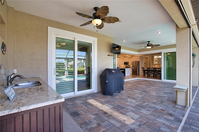 35 Medalist Rd, Rotonda West, FL 33947 - view of patio featuring a ceiling fan