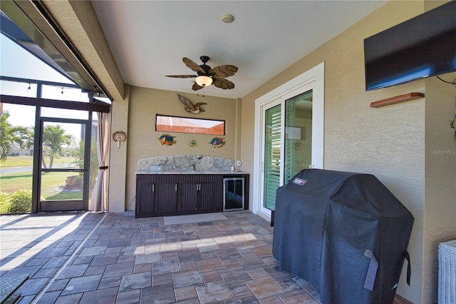 35 Medalist Rd, Rotonda West, FL 33947 - sunroom with a ceiling fan
