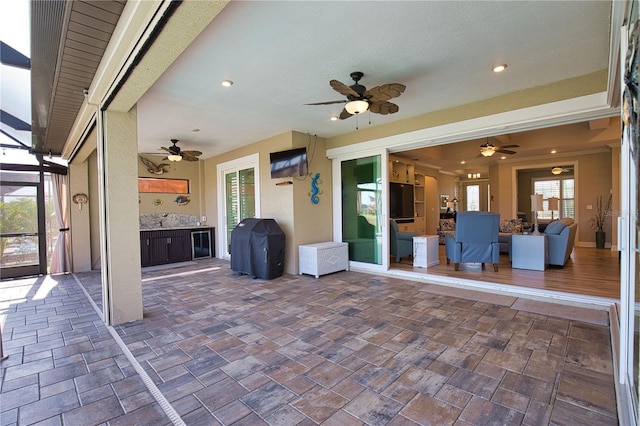 35 Medalist Rd, Rotonda West, FL 33947 - view of patio / terrace featuring ceiling fan and an outdoor kitchen