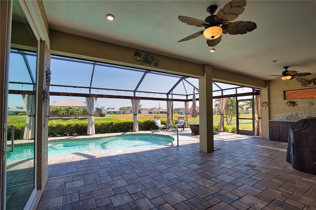 35 Medalist Rd, Rotonda West, FL 33947 - swimming pool with ceiling fan, a patio, and a lanai