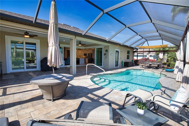 35 Medalist Rd, Rotonda West, FL 33947 - outdoor pool featuring a patio area, ceiling fan, and a lanai