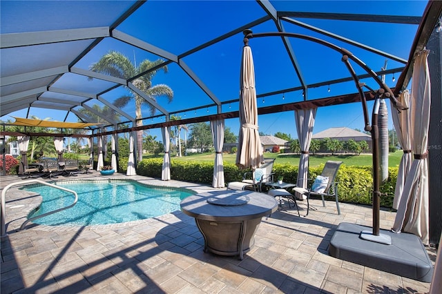 35 Medalist Rd, Rotonda West, FL 33947 - outdoor pool with a patio and glass enclosure