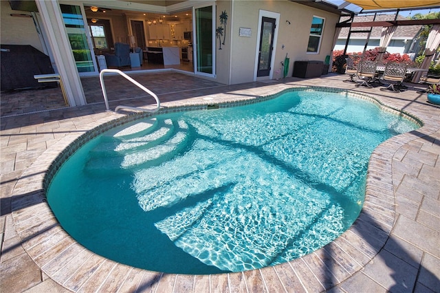 35 Medalist Rd, Rotonda West, FL 33947 - swimming pool with a patio area