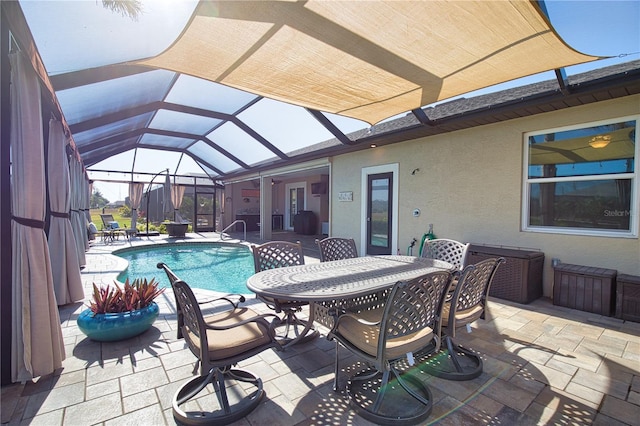 35 Medalist Rd, Rotonda West, FL 33947 - outdoor pool with a patio, glass enclosure, and outdoor dining space