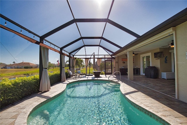 35 Medalist Rd, Rotonda West, FL 33947 - swimming pool with a patio, a ceiling fan, and a lanai