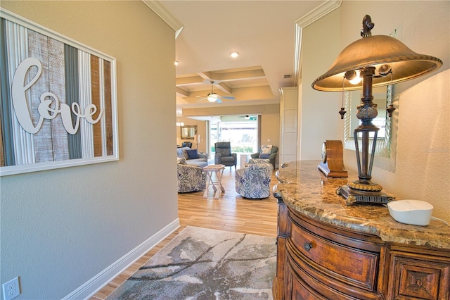 35 Medalist Rd, Rotonda West, FL 33947 - hallway featuring coffered ceiling, light wood-style floors, ornamental molding, beam ceiling, and recessed lighting