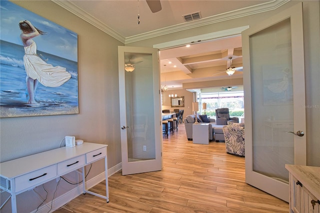 35 Medalist Rd, Rotonda West, FL 33947 - hallway with ornamental molding, french doors, light wood-style floors, beam ceiling, and coffered ceiling