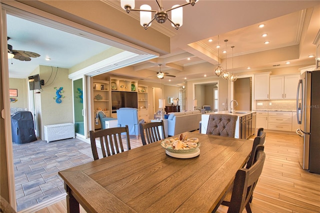35 Medalist Rd, Rotonda West, FL 33947 - dining room featuring ceiling fan, crown molding, a chandelier, light wood finished floors, and recessed lighting