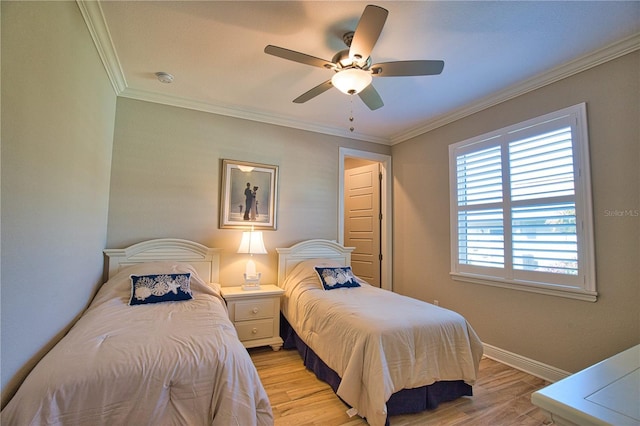 35 Medalist Rd, Rotonda West, FL 33947 - bedroom featuring light wood-type flooring, ornamental molding, and a ceiling fan