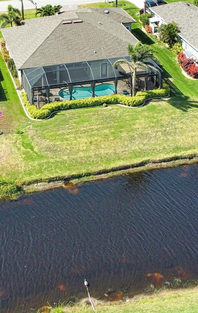 35 Medalist Rd, Rotonda West, FL 33947 - view of subject property featuring a nearby body of water and a pool area