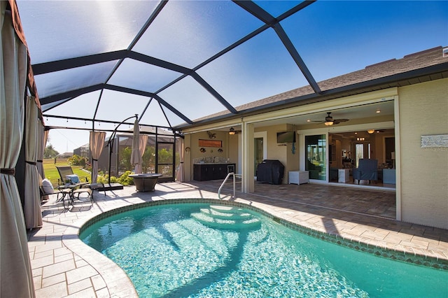 35 Medalist Rd, Rotonda West, FL 33947 - swimming pool featuring a patio area, ceiling fan, and glass enclosure