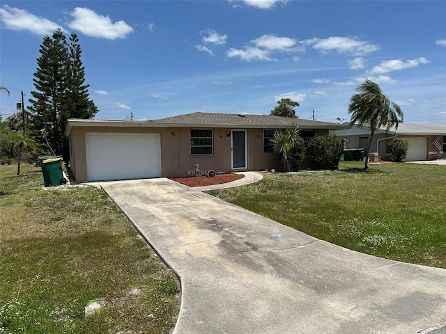 194 Garden Ave NW, Port Charlotte, FL 33952 - single story home featuring concrete block siding, an attached garage, a front lawn, and driveway