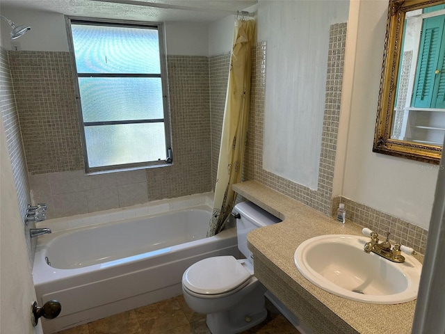 194 Garden Ave NW, Port Charlotte, FL 33952 - full bathroom featuring toilet, a healthy amount of sunlight, a sink, and shower / bath combo with shower curtain