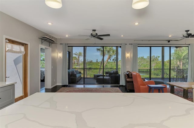 bedroom featuring access to outside, recessed lighting, and wood finished floors