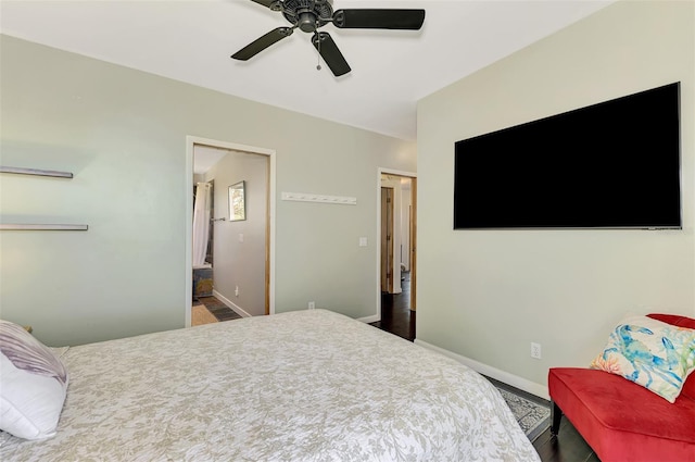 bedroom featuring baseboards and a ceiling fan