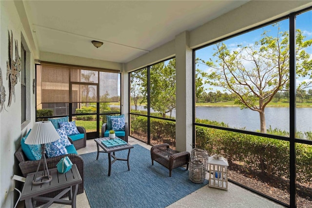 10805 Tarflower Dr Unit 101, Venice, FL 34293 - sunroom / solarium featuring a water view and outdoor lounge area
