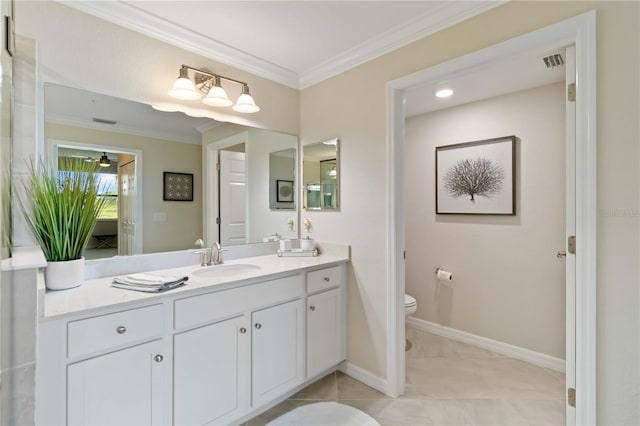 10805 Tarflower Dr Unit 101, Venice, FL 34293 - bathroom featuring toilet, crown molding, vanity, and baseboards