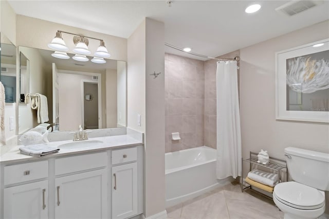10805 Tarflower Dr Unit 101, Venice, FL 34293 - full bath featuring toilet, shower / tub combo with curtain, vanity, recessed lighting, and tile patterned floors