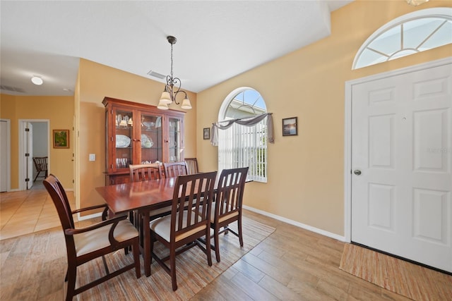 4004 Landor Ct, Venice, FL 34293 - dining room featuring baseboards, light wood finished floors, and visible vents